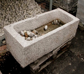 Click here for natural stone or granite made planters