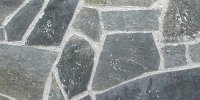 Rivestimento muro in pietra grigia irregolare