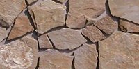 Rivestimento muro in pietra color terra di siena con forma irregolare